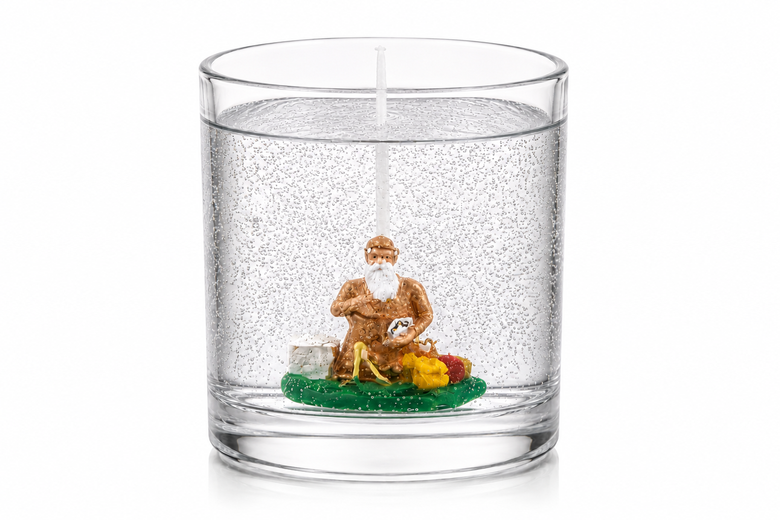 Vela em Gel Xangô artesanal em copo de vidro transparente, com figura decorativa de Xangô em seu interior, fotografada sobre fundo branco em estilo catálogo, destacando a transparência do gel e os detalhes da composição.